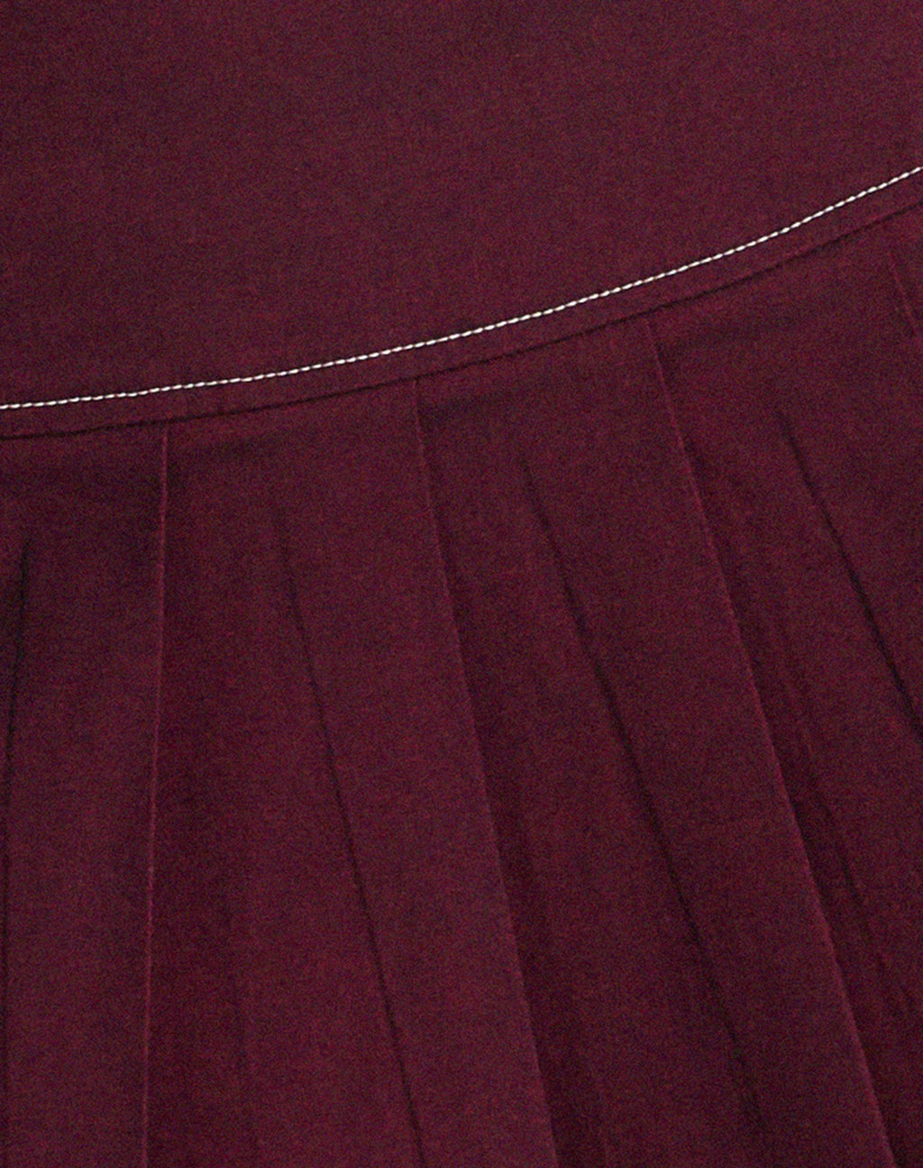 Zabini Low Rise Pleated Mini Skirt in Burgundy with Ecru Stitch Detail